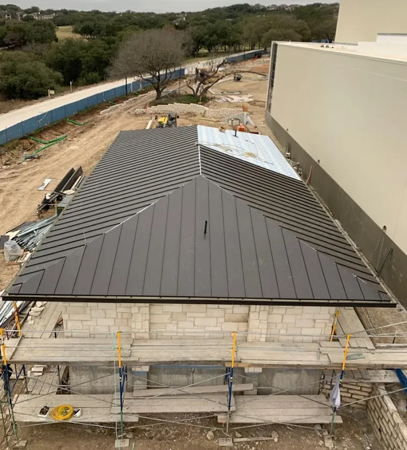 Metal roof new construction with scaffolding in Savannah